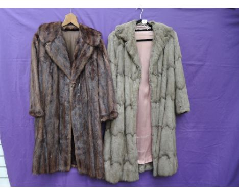 Two ladies vintage fur coats, one dark, one light good condition.medium sizes.