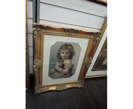 An early 20th century print in ornate gilt and plaster frame