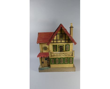 An Early 20th Century Dolls House with Fitted Interior and Some Furniture, Three Light Switches to Reverse, 60cm High  