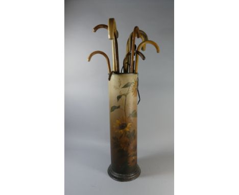 A Cylindrical Floral Decorated Stick Stand Containing Ten Various Walking Sticks and Umbrella 