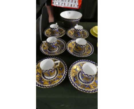 A Set of Six Coalport Cobalt Blue and Gilt Coffee Cans and Saucers Together with Tea Bowl Decorated with Birds and Bamboo 