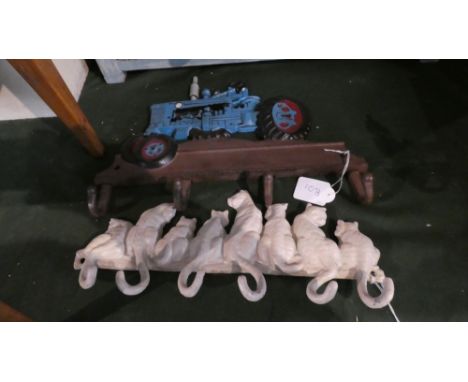 Two Cast Metal Wall Mounting Cup Holders One in the Form of a Series of Cats and the Other In the Form of a Vintage Tractor, 