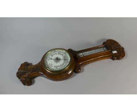 A Late Victorian Oak Wheel Barometer with Temperature Scale, 55cm High  