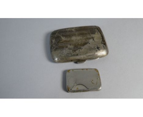 A Silver Cigarette Case with Engine Turned Decoration Together with Vesta Case
