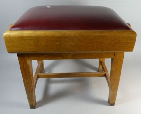 A Light Oak Adjustable Piano Stool with Hide Upholstery, 60cm Wide