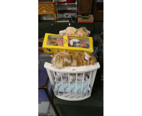 A Vintage Wooden Dolls Crib Together with Dolls and Boxed Pelham Puppet