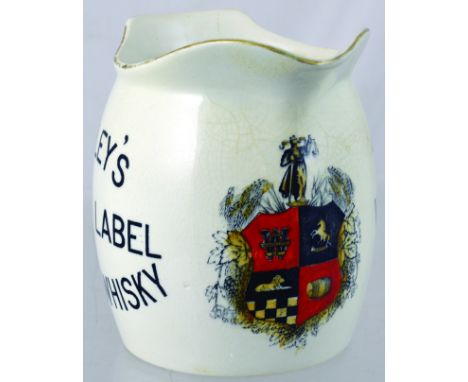 SHEFFIELD PUB JUG. 4.5ins tall, white glaze body, coloured coat of arms to front. TENNANTS/ STRONG/ WHARNCLIFFE/ ALE SHEFFIEL