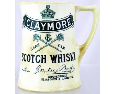 CLAYMORE PUB JUG. 4.25ins tall, white glaze, deep green transfer. CLAYMORE/ SCOTCH WHISKY/ SOLE PROPRIETORS GREENLEES BROTHER