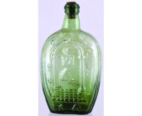 ENGLISH MADE MASONIC FLASK. 8ins tall, mid olive green glass, applied collar lip. Raised masonic symbols within arch etc. to 