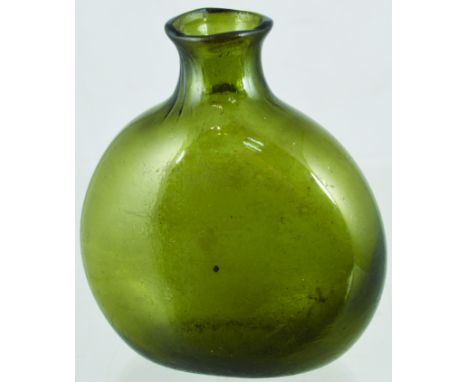 EARLY FLASK. 5ins tall, dark olive green glass. Flattened bladder shape. Very crude/ wavy lip, sharp pontil in recessed base.
