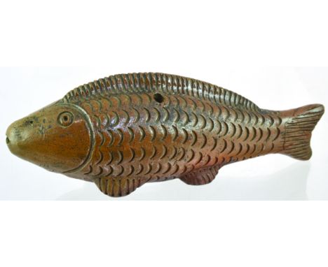 FISH WHISTLE. 8ins long. Brown glazed salt glaze stoneware whistle/ Ocarina in the form of an open mouthed fish with scales. 