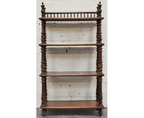 Victorian walnut open book shelf, top with a three quarter spindle gallery, width 62cm.