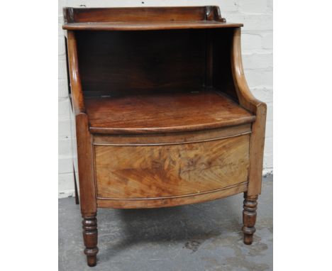 A Victorian mahogany commode chest, with turned front legs.