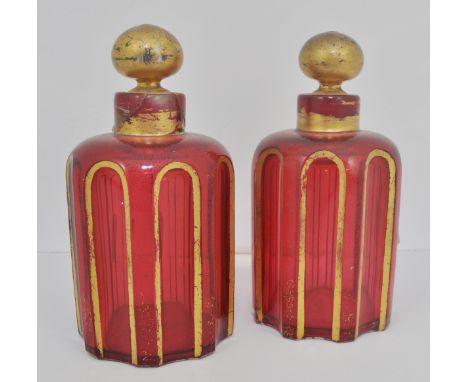 Pair of Continental ruby glass scent bottles, (damaged).