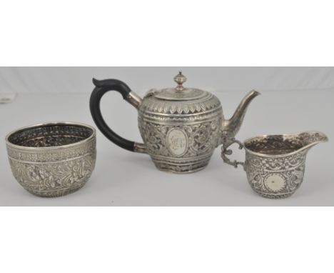 Victorian matched three piece silver teaset, teapot by Gibson & Langman, London 1855, and a milk jug and sugar bowl to match 