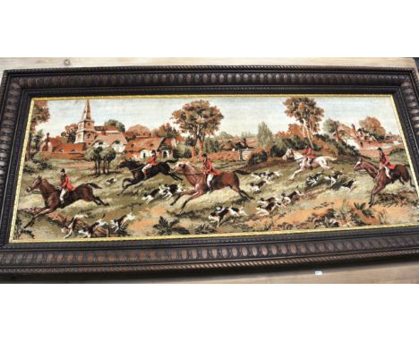 A modern tapestry panel, hunting scene, oak frame, the panel length 155cms.