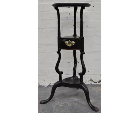A 19th Century maohgany gentlemans wig stand, tripod base.