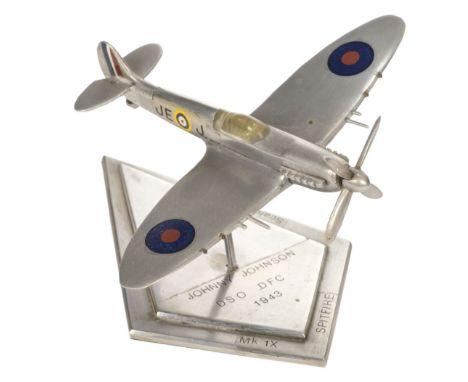 Desktop Model. A Spitfire Mk 1X 1-72 scale desktop model, aluminium model with roundel on the wings and tail fin, aircraft re