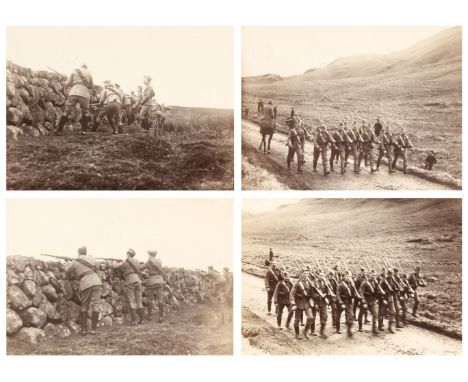 Military Photographs. An album containing 16 black and white photographs (10.5 x 15cm) of 9th Queen's Royal Lancers at their 
