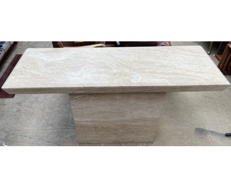 A marble console table with a rectangular top on a box base,  135cm wide  