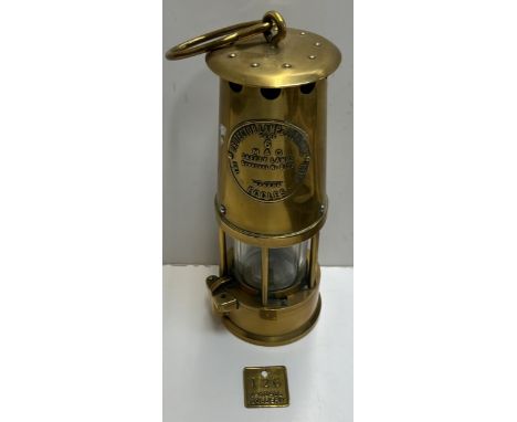A square brass tally for the Oakdale Colliery, No.126 together with as brass miner's lamp