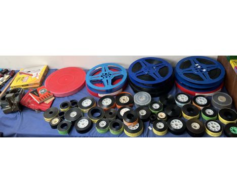 A part from a Westrex 5000 cinema projector, together with film reels and trailer reels