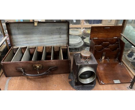 A Welch Patent railway signalling lamp together with an oak stationery cabinet and a shotgun cartridge magazine case, belongi