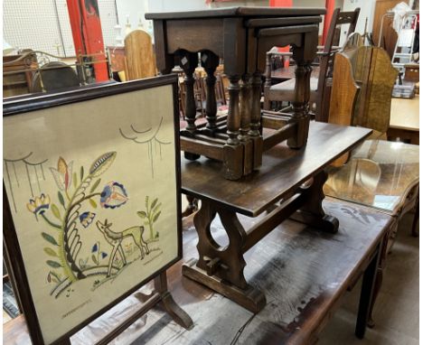 An oak nest of tables together with an oak occasional table and a fire screen