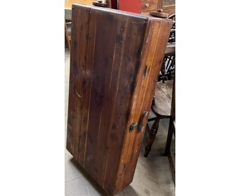 An early 20th century pine under bed storage trunk