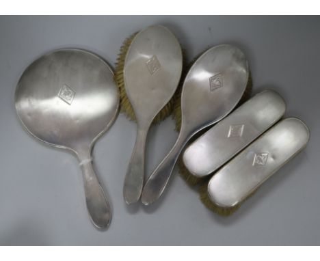 A 1930's engine turned silver five piece mirror and brush set, Barker Brothers Silver Ltd, Birmingham, 1936/8.