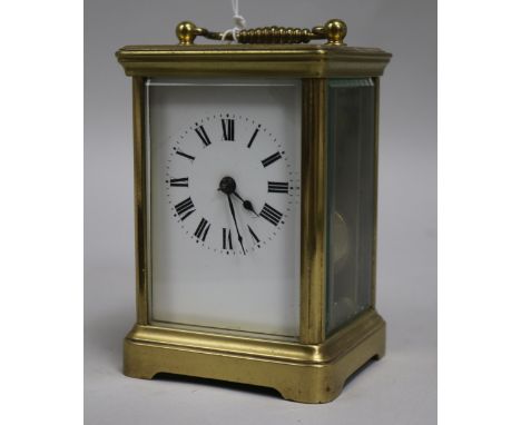 A French brass carriage clock with leather case