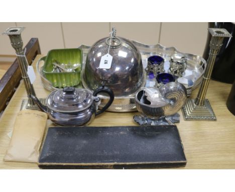 An Elkington & Co plated meat cover, a pair of Corinthian column candlesticks, a large oval tray and sundry plate, including 