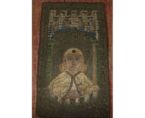 A 17th century needlework ophrey panel, depicting a figure beneath a castle rampant