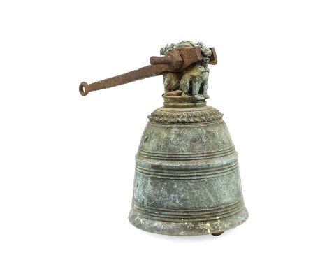 A Chinese Bronze Temple Bell, late Qing Dynasty, of ribbed domed form with dragon finial, on cast iron hinged bracket38cm hig