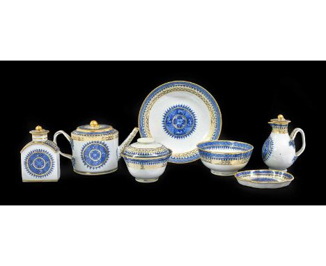 A Chinese Porcelain Tea Service, Jiaqing, painted in underglaze blue and highlighted in gilt with roundels within formal bord
