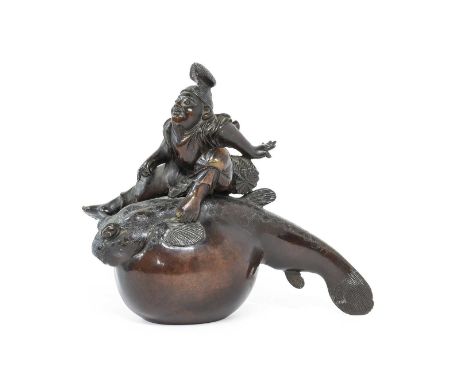 A Japanese Bronze Figure of Kinko, Meiji period, riding on a back of a large carp, signed14cm highTriangular patch of repair 