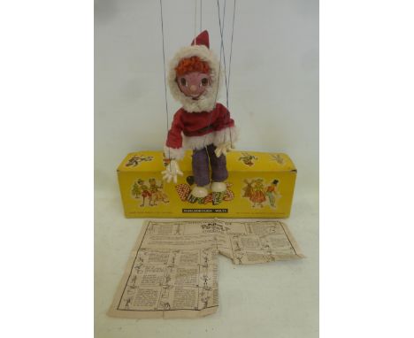 A boxed Pelham Puppet, Eskimo Boy, circa early 1960s and not made for very long, complete with instructions. 