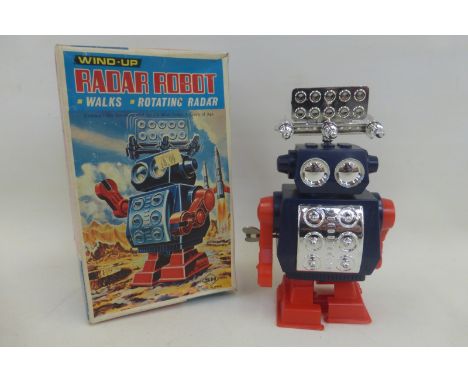 A boxed wind-up Radar Robot, made in Japan.