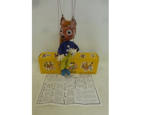 A boxed Pelham Puppet: Tufty, 1960s with instructions and plastic legs.