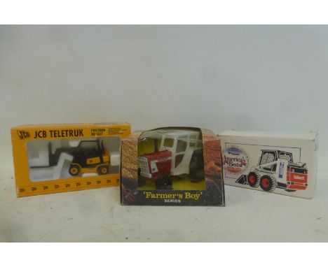 A boxed Lone Star 'Farmer's Boy' series die-cast tractor and two boxed die-cast commercial vehicles.