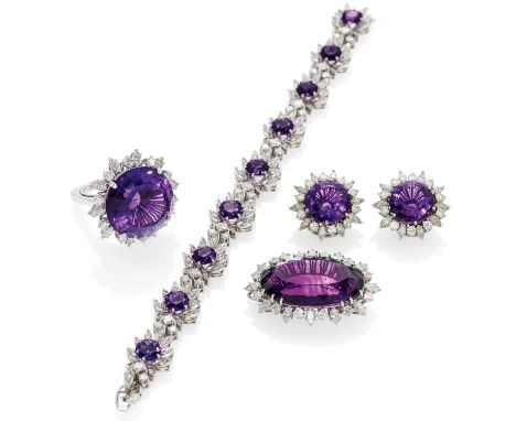 AMETHYST-DIAMOND-SET. Germany, ca. 1970. 750/- white gold, total weight: 84.5g. EU-RM: 57. Bracelet L.ca. 18.0cm, earclips D.