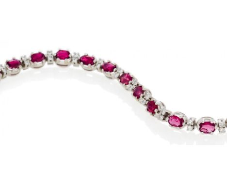 RUBY-DIAMOND-BRACELET. Germany, ca. 1980/90. 750/- white gold, total weight: 21.0g. L.ca. 18.5cm. 36 brilliants in total ca. 