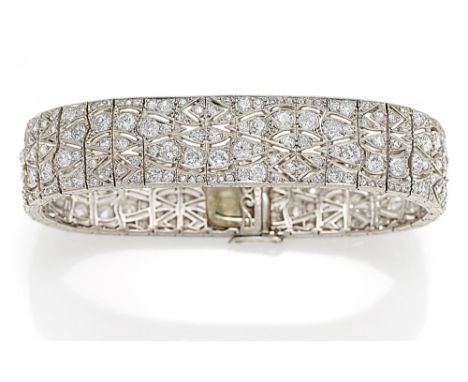 DIAMOND-BRACELET. France, ca. 1930. 950/- platinum, clasp 750/- white gold, total weight: 47.9g. L x W=ca. 18.2 x 1.5cm. Ca. 