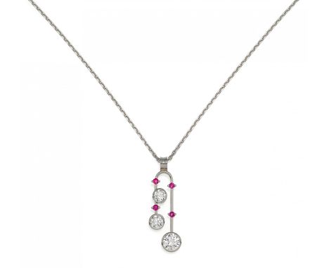DIAMANT-RUBY-PENDANT. Germany, ca. 1970/80. 950/- platinum, total weight: 8.0g. L.ca. 4.3cm. 3 brilliants in total ca. 2.9ct 