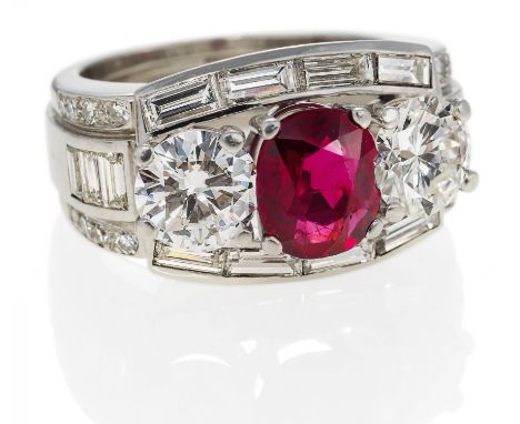 RUBY-DIAMOND-RING. Presumably Switzerland, ca. 1980/90. 950/- platinum, total weight: 13.5g. EU-RM: 52.5. 2 brilliants in tot