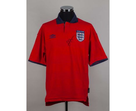 England red short sleeved Replica 2000 shirt, autographed by David Beckham, Umbro, size M, button up collar with embroidered 