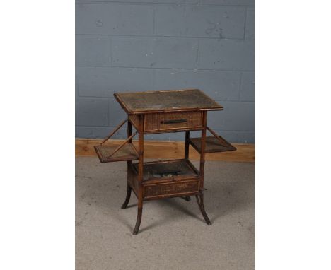 Victorian bamboo side table, the rectangular top above two side drop leaves, with a storage compartment below with hinged top