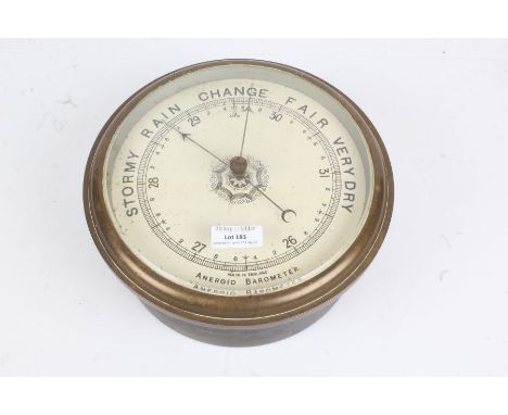Brass cased bulk head style aneroid barometer, 23cm diameter