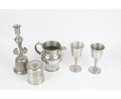 Pewter ware, to include candlestick, jug, pot and cover, pair of goblets (5)
