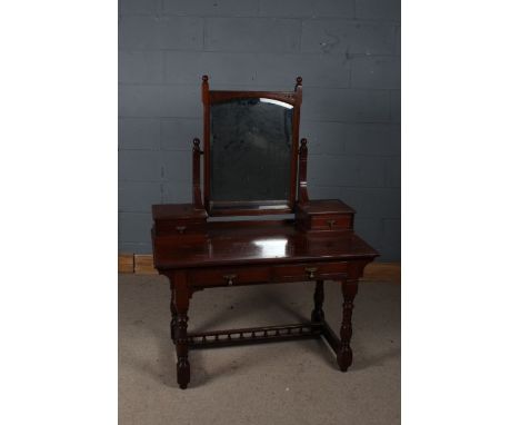 Late Victorian mahogany dressing table, with central mirror, two drawer tidies, and a further two drawers below, 107cm wide, 